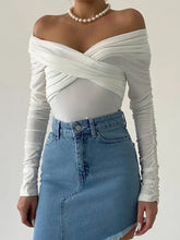 White off-shoulder ruched long sleeve bodysuit showcasing a stylish and comfortable long sleeve design for versatile wear
