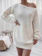 Cream off-the-shoulder white knit dress with ribbed texture and fur trim cuffs