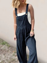 Dark blue plaid wide leg overalls with pockets and wooden buttons