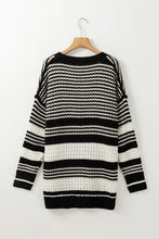 Black and white ribbed striped sweater with wooden buttons