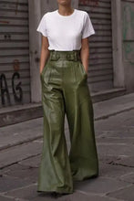 Olive green high-waisted wide-leg leather pants with belt detail