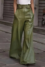 Olive green high-waisted wide-leg leather pants with belt loops and buckle details