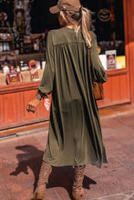 Olive green midi dress with regular sleeve length and modest hem width