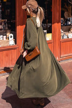 Olive green midi dress with regular sleeve length and modest hem width