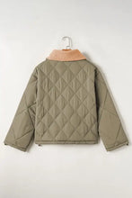 Olive green quilted bomber jacket with sherpa lining and toggle closures