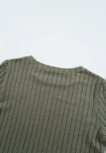 Olive green ribbed knit top with semi-sheer stretch leopard shoulder accents