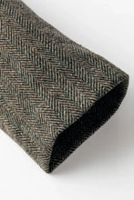 Dark gray and black herringbone wool scarf with soft textured finish