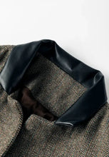 Brown herringbone wool jacket with black leather trim