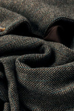 Olive green herringbone wool blazer with brown lining and gold buttons