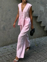 Soft pink sleeveless linen top with v-neck and peplum hem from One Button Set