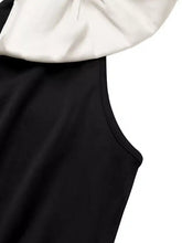 Black sleeveless top with white ruffled collar on bowknot wide leg jumpsuit