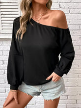 Black one-shoulder long sleeve casual sweatshirt with elastic cuffs and relaxed fit, machine wash and tumble dry safe