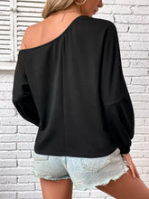 Black one-shoulder long sleeve casual sweatshirt with flowing sleeves and relaxed fit suitable for machine wash tumble dry