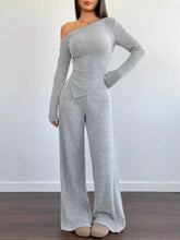 Stylish one-shoulder gray knit jumpsuit with fitted bodice and wide-leg pants