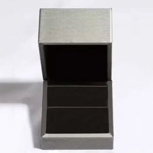 Sterling silver open ring with marquise green gemstone in stainless steel box