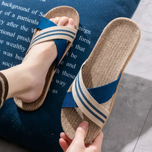 Open toe flats slippers with blue beige woven criss-cross straps and textured fiber sole