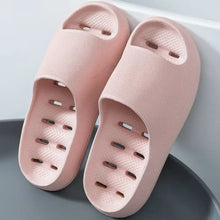 Pair of pink open toe flats slippers with drainage holes