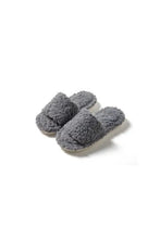 Pair of plush gray open toe flats slippers