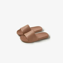 Light brown open toe flats slippers with open-toed slide design