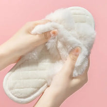 Soft white open toe flats slippers squeezed to show plush comfort