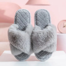Pair of soft grey faux fur open toe flats slippers with criss-cross straps