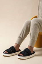 Black ribbed double-strap open toe fluff platform slippers with white soles