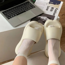 Cream-colored open toe platform slippers with ribbed white socks