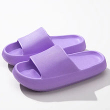 Pair of lavender purple soft chunky open toe platform slippers