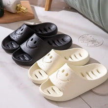 Pairs of black and white waterproof smiley face open toe platform slippers