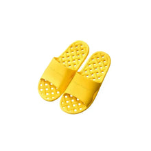 Bright yellow open toe platform slippers with lattice pattern