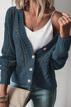 Teal open-front knit cardigan with lace detailing, buttons, and pockets