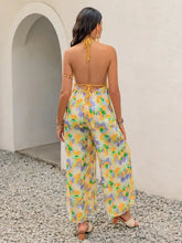 Lebhafter Jumpsuit mit Neckholder, floralem Muster und weitem Bein, maschinenwaschbar bei Kaltwäsche