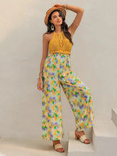 Gelber, durchbrochener Neckholder-Jumpsuit mit Blumenmuster und weitem Bein, maschinenwaschbar bei Kaltwäsche
