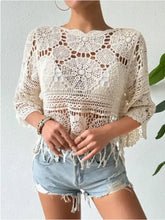 Off-white openwork round neck crocheted crop top with fringe hem
