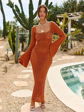 Woman in openwork square neck flare sleeve crochet maxi dress with bikini