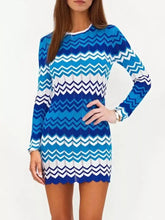 A vibrant blue and white zigzag-patterned long-sleeved mini dress with a scalloped hem.
