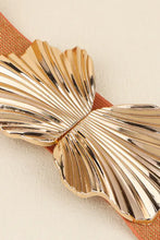 Gold zinc alloy butterfly buckle on orange elastic belt with tan leather accents