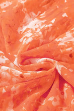 Orange floral chiffon scarf on smocked printed long sleeve maxi dress