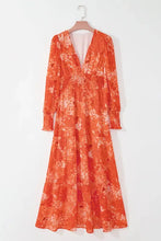 Orange floral smocked printed long sleeve maxi dress with V-neck
