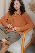 Orange fuzzy long sleeve cardigan with collared neck button front