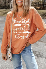 Orange letter graphic round neck long sleeve sweatshirt with thankful grateful blessed print