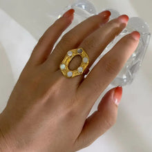 Oval statement ring with mother-of-pearl cabochons in 18k gold-plated steel