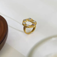 Oval statement ring with mother-of-pearl cabochons in 18k gold-plated steel