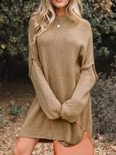 Oversize drop shoulder slouchy sweater dress in cozy beige knit with ribbed cuffs