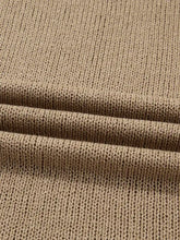 Oversize drop shoulder slouchy sweater dress in beige ribbed knit fabric