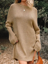 Oversize drop shoulder slouchy sweater dress in cozy beige knit with ribbed cuffs