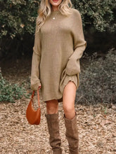 Oversize drop shoulder slouchy sweater dress in cozy beige knit with ribbed cuffs