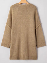 Oversize drop shoulder slouchy sweater dress in cozy beige knit with ribbed cuffs