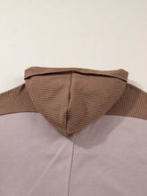 Brown oversize waffle patchwork exposed seam casual hoodie with waffle-knit hood and matching ribbed edges