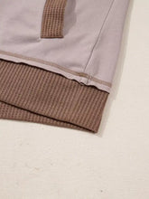 A soft lavender oversize waffle patchwork casual hoodie with brown waffle-knit hem and exposed seam details